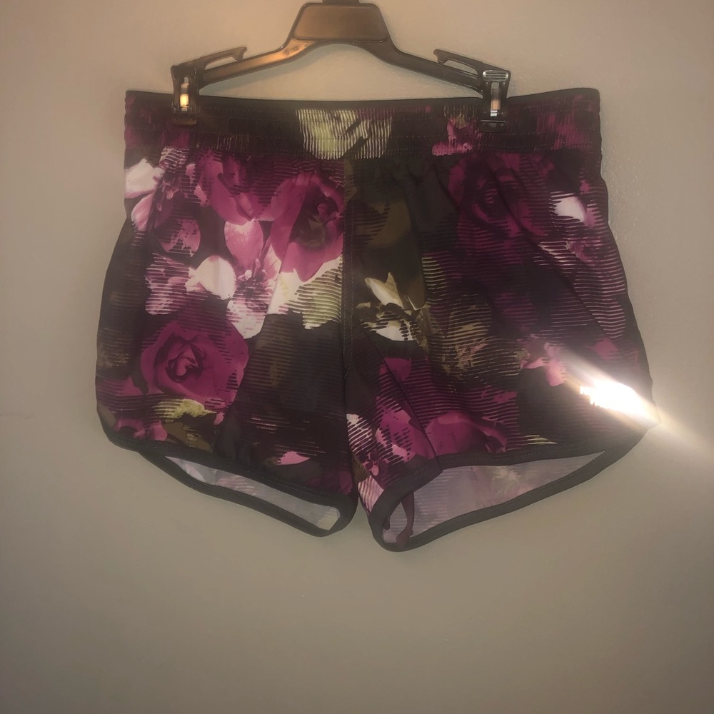 The North Face purple floral running shorts - Picture 3 of 4